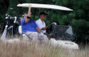 Wolf and Obama in Martha's Vineyard in 2010 / AP Images
