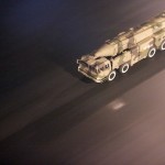 A missile launcher drives down a street in Beijing, China / AP