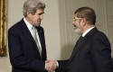 John Kerry with Egyptian President Mohamed Morsi / AP