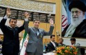 Iranian President Mahmoud Ahmadinejad and chief of staff Esfandiari Rahim Mashaei, March 2013 / AP