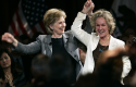 Hillary Clinton and Susie Tompkins Buell in 2008 / AP