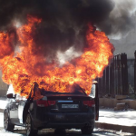 A car attacked by Syrian government forces, whom Hezbollah has been assisting. (AP/Aleppo Media Center, AMC)