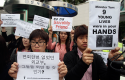 South Korean protesters stage a rally urging China to stop repatriating North Korean defectors. (AP)