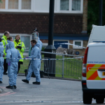Police and forensic officers near the scene of an attack. (AP)