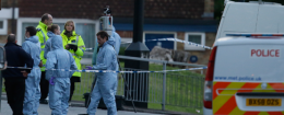 Police and forensic officers near the scene of an attack. (AP)