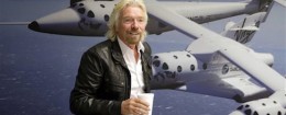 The Economist brought in Richard Branson, seen at the  Virgin Galactic hangar, to help forecast 2014 / AP