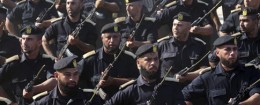 Members of Palestinian Hamas security forces march during their graduation ceremony at the fisherman's port in Gaza City