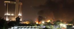 Smoke rises from the site of car bomb attack in Baghdad