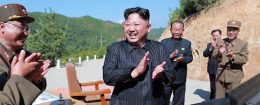 North Korean leader Kim Jong-Un celebrates the successful test-fire of the intercontinental ballistic missile Hwasong-14