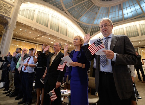 mmigrants take the oath of allegiance at a naturalization ceremony in New York