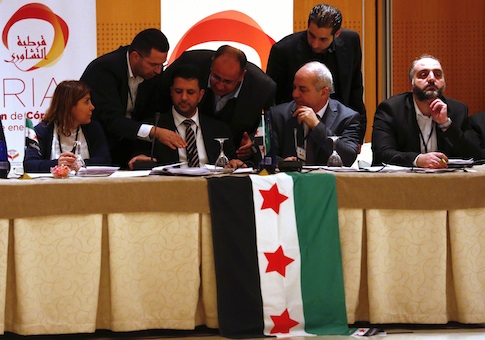 Syrian former parliamentary member Mohammad Barmo (3rd L) and members of Syrian opposition groups attend a consultative meeting in Cordoba, southern Spain January 10, 2014