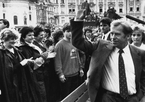 Czechoslovakian President Vaclav Havel waves to a cheering crowd in Prague