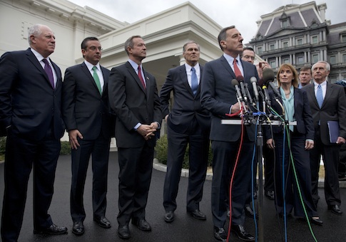 Democratic governors meet with members of the media outside the White House following a meeting with President Obama