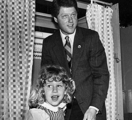 Chelsea, age 6, with then Arkansas Gov. Bill Clinton / AP