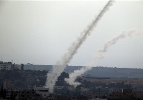 smoke trails are seen after missiles are fired by Palestinian militants from Gaza City towards southern Israel