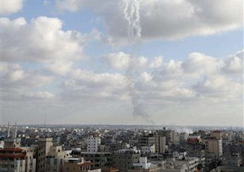 The smoke trail of multiple missiles fired by Palestinian militants from inside northern Gaza Strip
