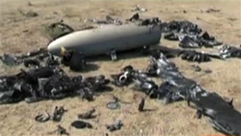 In this undated image taken from the Iranian state TV's Arabic-language channel Al-Alam, shows what the broadcast purports is an Israeli drone the country's Revolutionary Guard claimed to have shot down over the weekend near an Iranian nuclear site