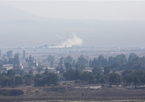Smoke caused by fighting in Syria is seen from the Israeli-controlled Golan Heights, close to the border with Syria