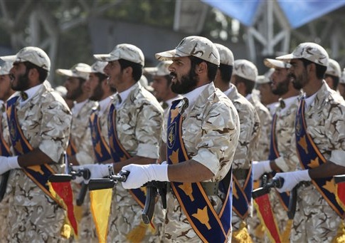 Members of Iran's Revolutionary Guard march