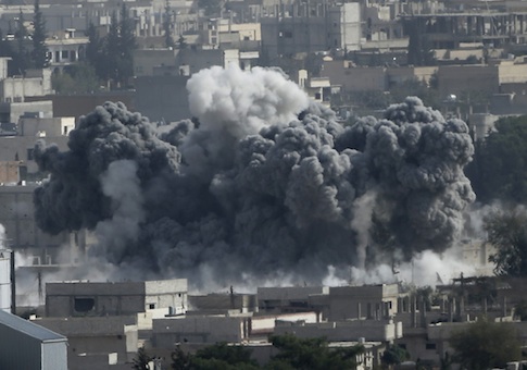 Smoke rises from the Syrian town of Kobani