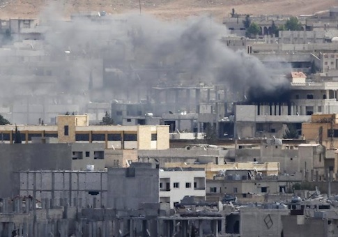 Smoke rises over Syrian town of Kobani, as seen from the Mursitpinar crossing on the Turkish-Syrian border