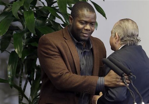 Josephus Weeks is introduced by his attorney during a news conference in Dallas