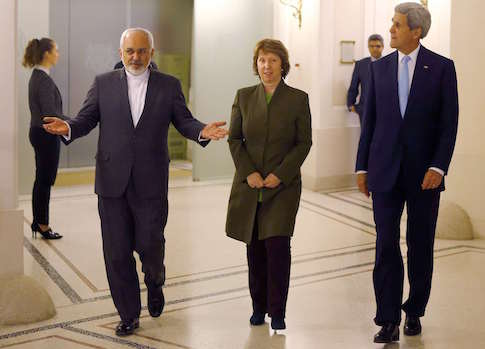 U.S. Secretary of State John Kerry (R), Iranian Foreign Minister Javad Zarif (L) and EU envoy Catherine Ashton arrive for a meeting in Vienna November 20