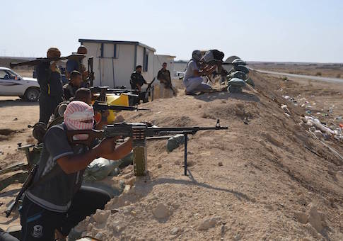 Tribal fighters take part in an intensive security deployment against Islamic State militants in Haditha October 25