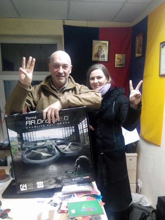 George Tuka and Oksana Labunska pose with a surveillance drone.