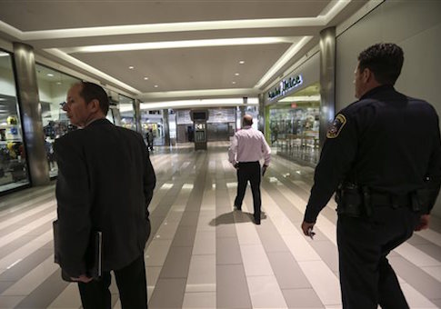 Mall of America security officials walked through the Mall of America on Monday, Feb. 23, 2015 in Bloomington, Minn.