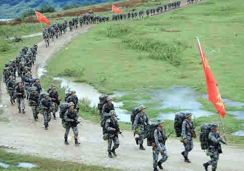 Chinese PLA (People's Liberation Army) soldiers march during a military drill in southwest China's Sichuan province, 23 September 2014