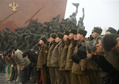 N. Korean soldiers salute before late leaders' statutes