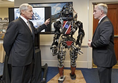 Before leaving office, Defense Secretary Chuck Hagel got a look at high-tech projects being developed by the Defense Advanced Research Projects Agency. Brad Tousley demonstrated a robot that would assist wounded warriors