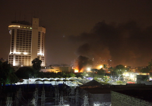 Smoke rises from the site of car bomb attack in Baghdad