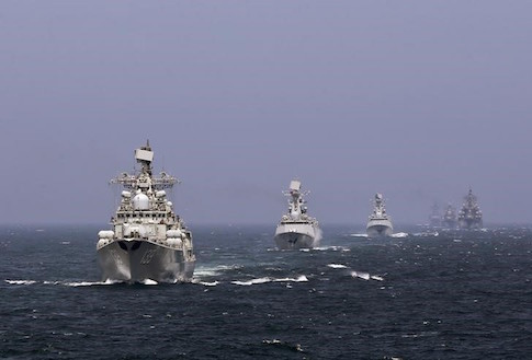 Chinese and Russian naval vessels participate in the Joint Sea-2014 naval drill outside Shanghai on the East China Sea, in this file photo taken on May 24, 2014.