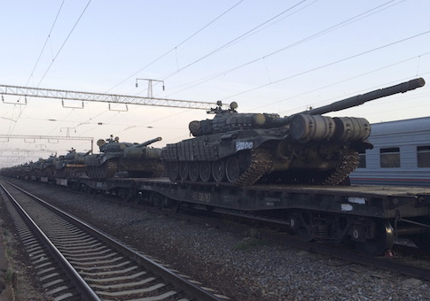 Tanks are seen on a freight train shortly after its arrival at a railway station in the Russian southern town of Matveev Kurgan