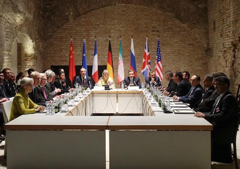 Negotiators of Iran and six world powers face each other at a table in the historic basement of Palais Coburg hotel in Vienna