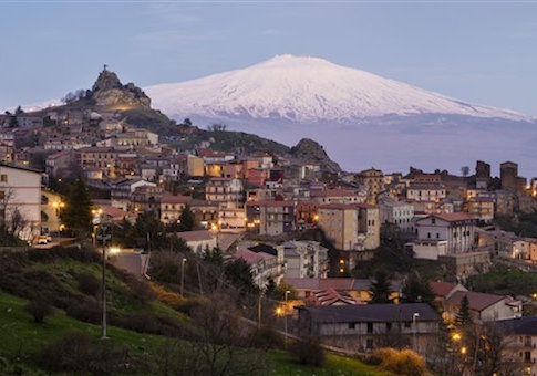 High angle view of Mt Etna over Cesaro cityscape, Messina, Sicily
