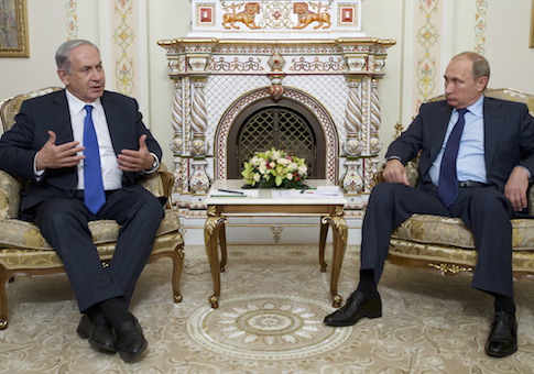 Israeli Prime Minister Netanyahu speaks with Russian President Putin during their meeting at Novo-Ogaryovo state residence outside Moscow