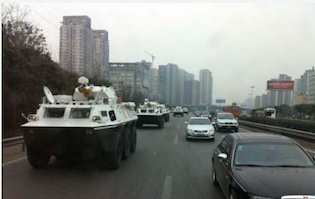 Armored personnel carrier dispatched by Bo Xilaito capture defector Wang Lijun