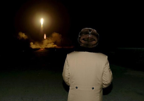 KCNA file picture shows North Korean leader Kim Jong Un watching the ballistic rocket launch drill of the Strategic Force of the Korean People's Army at an unknown location
