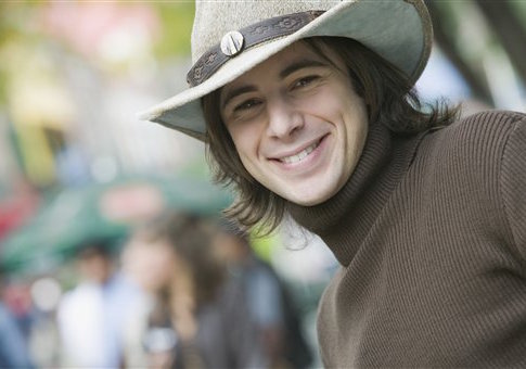 Stock photo of a man wearing cowboy hat