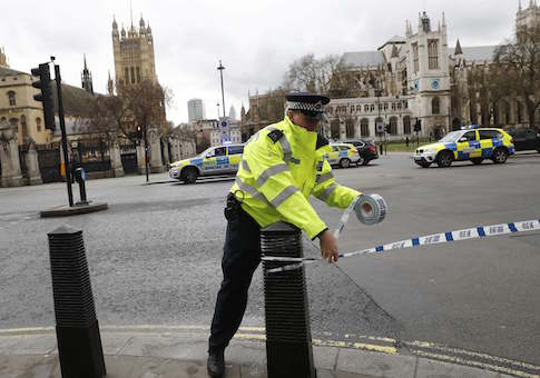 Police tapes off Parliament Square after reports of loud bangs, in London