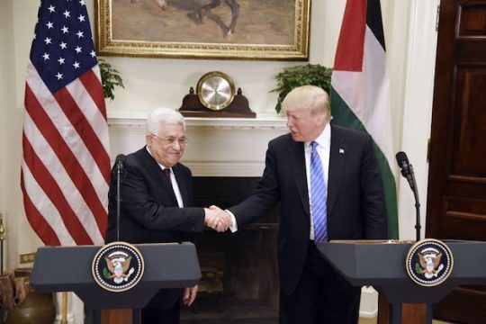 U.S President Donald Trump shakes hands with President Mahmoud Abbas of the Palestinian Authority after a joint statement in the Roosevelt Room of the White House