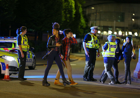 Police and fans close to the Manchester Arena