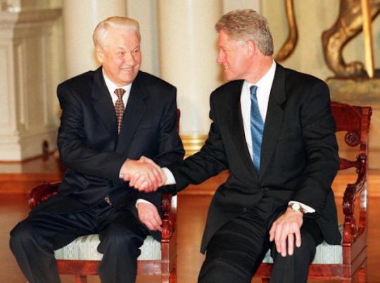 This picture taken in March 1997 shows U.S. President Bill Clinton and Russian President Boris Yeltsin shaking hands at the Presidential Palace