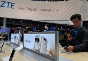 A visitor tests ZTE Blade v8 phone