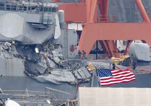 The Arleigh Burke-class guided-missile destroyer USS Fitzgerald, damaged by colliding with a Philippine-flagged merchant vessel, is seen at the U.S. naval base in Yokosuka, Japan