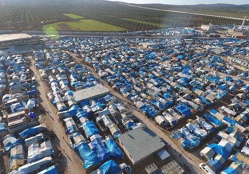 An aerial view shows the Bab al-Salama camp, set up outside the Syrian city of Azaz on Syria's northern border with Turkey