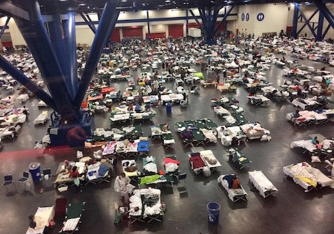 Evacuees take shelter from Tropical Storm Harvey in the George R. Brown Convention Center in Houston